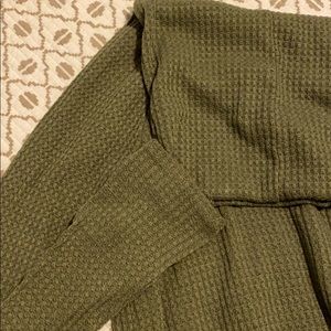 Green turtle neck shirt